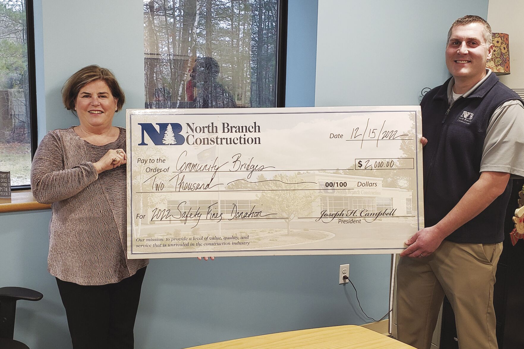 North Branch Construction donates Safety Fine Program proceeds to Lake Region Community Developers